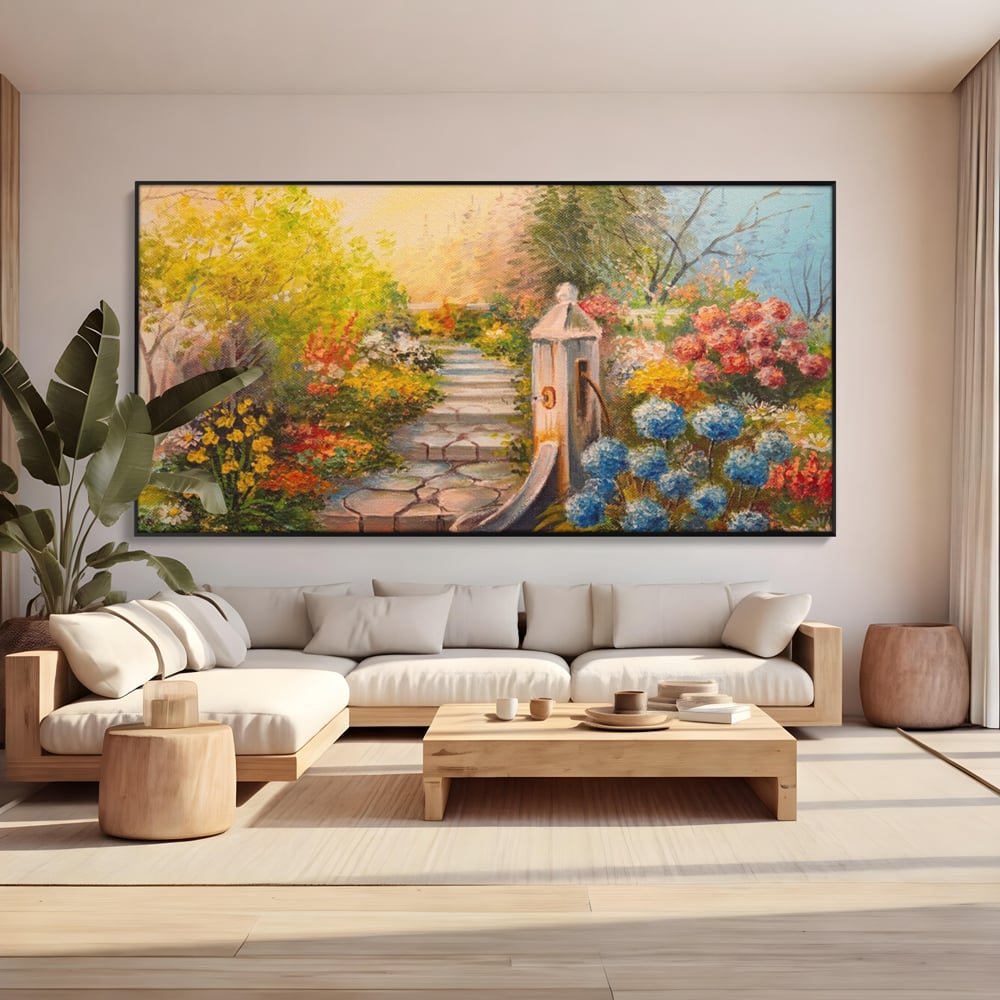 Tablou canvas cu pictura decorativa cu alee florala si fantana, in rama de aluminiu negru, pe perete intr-un living